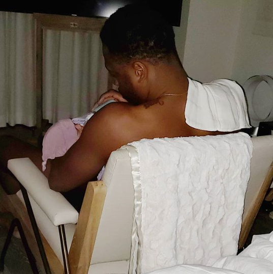 Dwyane Wade bottle feeds his and Gabrielle Union