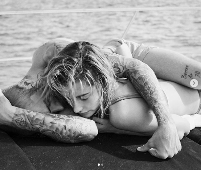 Justin Bieber and his wife Hailey Baldwin share a kiss on the beach in racy new photos 