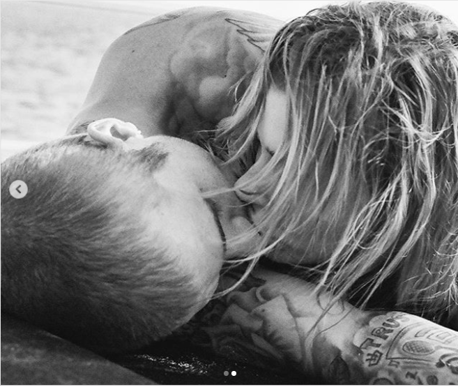 Justin Bieber and his wife Hailey Baldwin share a kiss on the beach in racy new photos 
