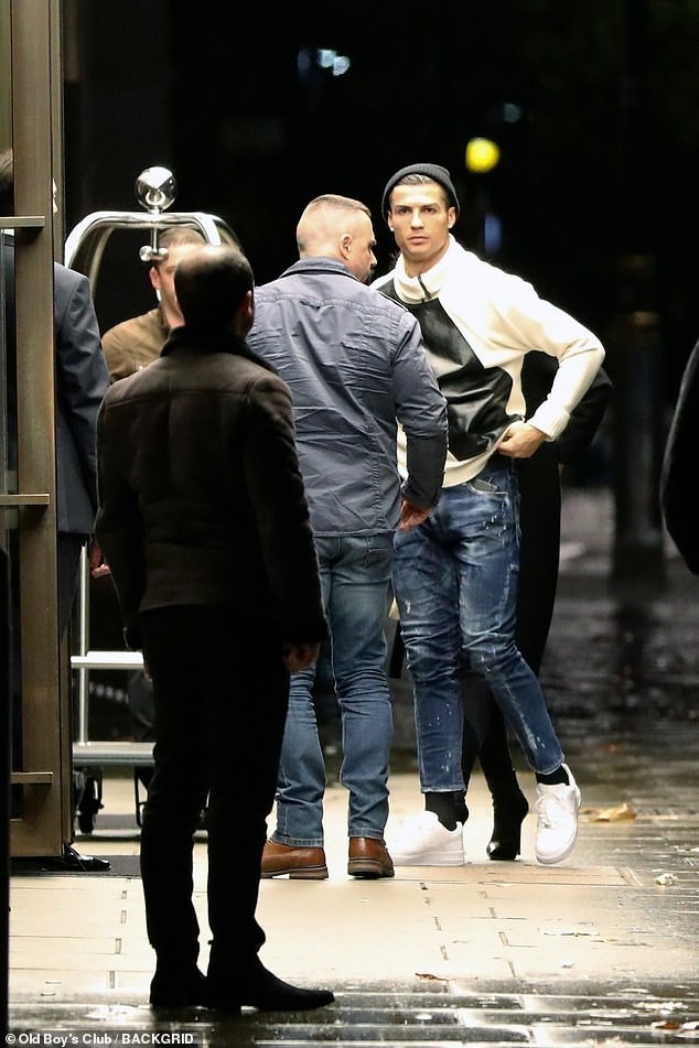 Cristiano Ronaldo arrives at a London hotel with his girlfriend Georgina Rodriguez and son Cristiano Jr (Photos)