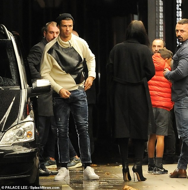 Cristiano Ronaldo arrives at a London hotel with his girlfriend Georgina Rodriguez and son Cristiano Jr (Photos)