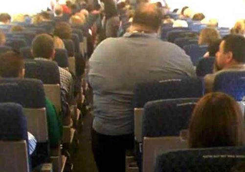 Passenger sues British Airways after he was made to seat near ?extremely large man?