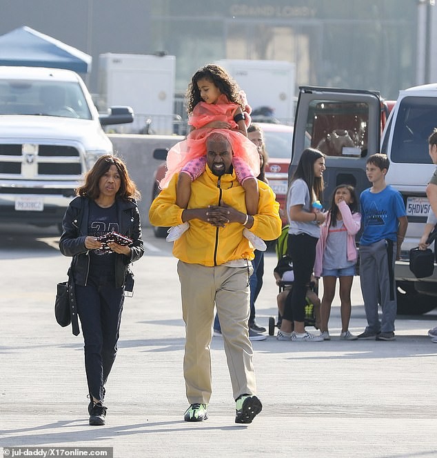 Kanye West and North share beautiful daddy-daughter time during museum tour (photos)