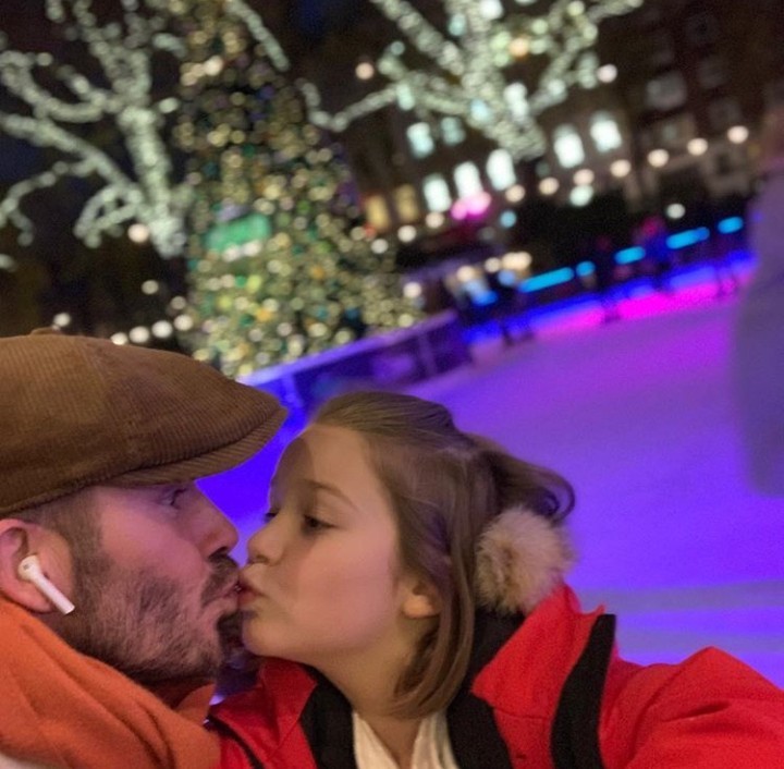 David Beckham and daughter share a kiss but internet users think it