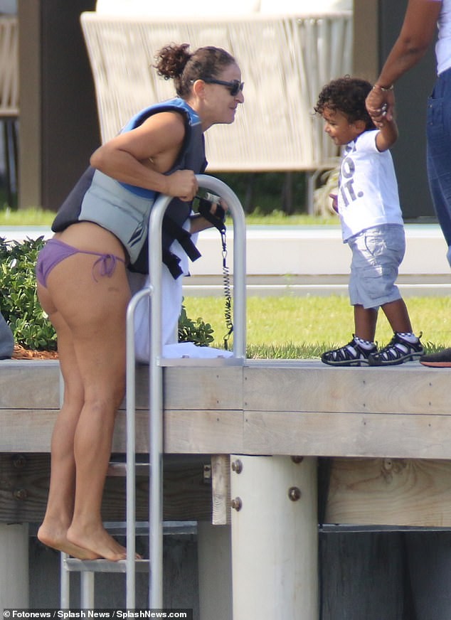 DJ Khaled and his wife Nicole Tuck ride jet skis around Miami on his 43rd birthday (Photos)