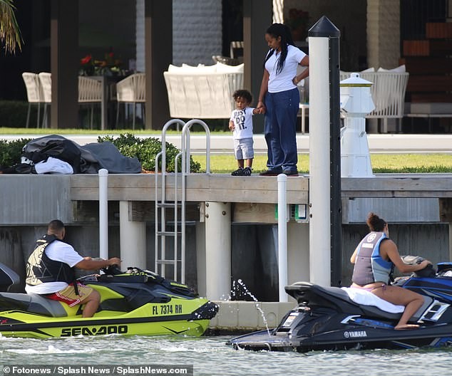 DJ Khaled and his wife Nicole Tuck ride jet skis around Miami on his 43rd birthday (Photos)