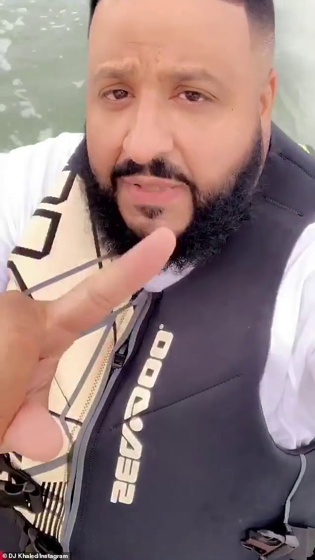 DJ Khaled and his wife Nicole Tuck ride jet skis around Miami on his 43rd birthday (Photos)