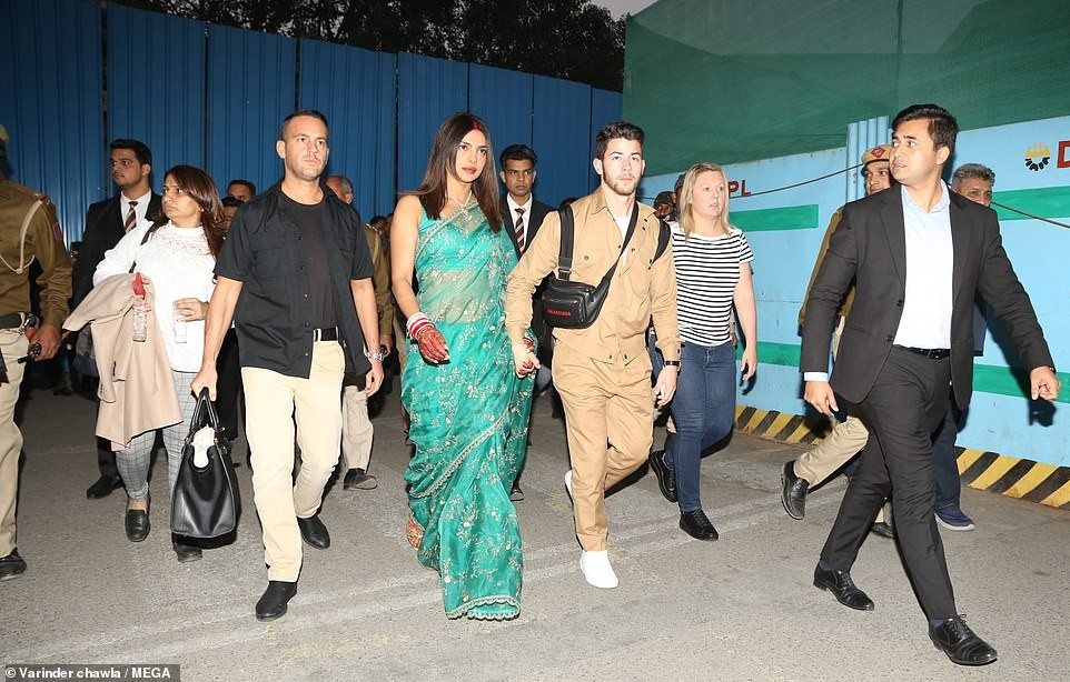 Newlyweds Priyanka Chopra and Nick arrive in style to celebrate another wedding reception in Delhi (Photos)