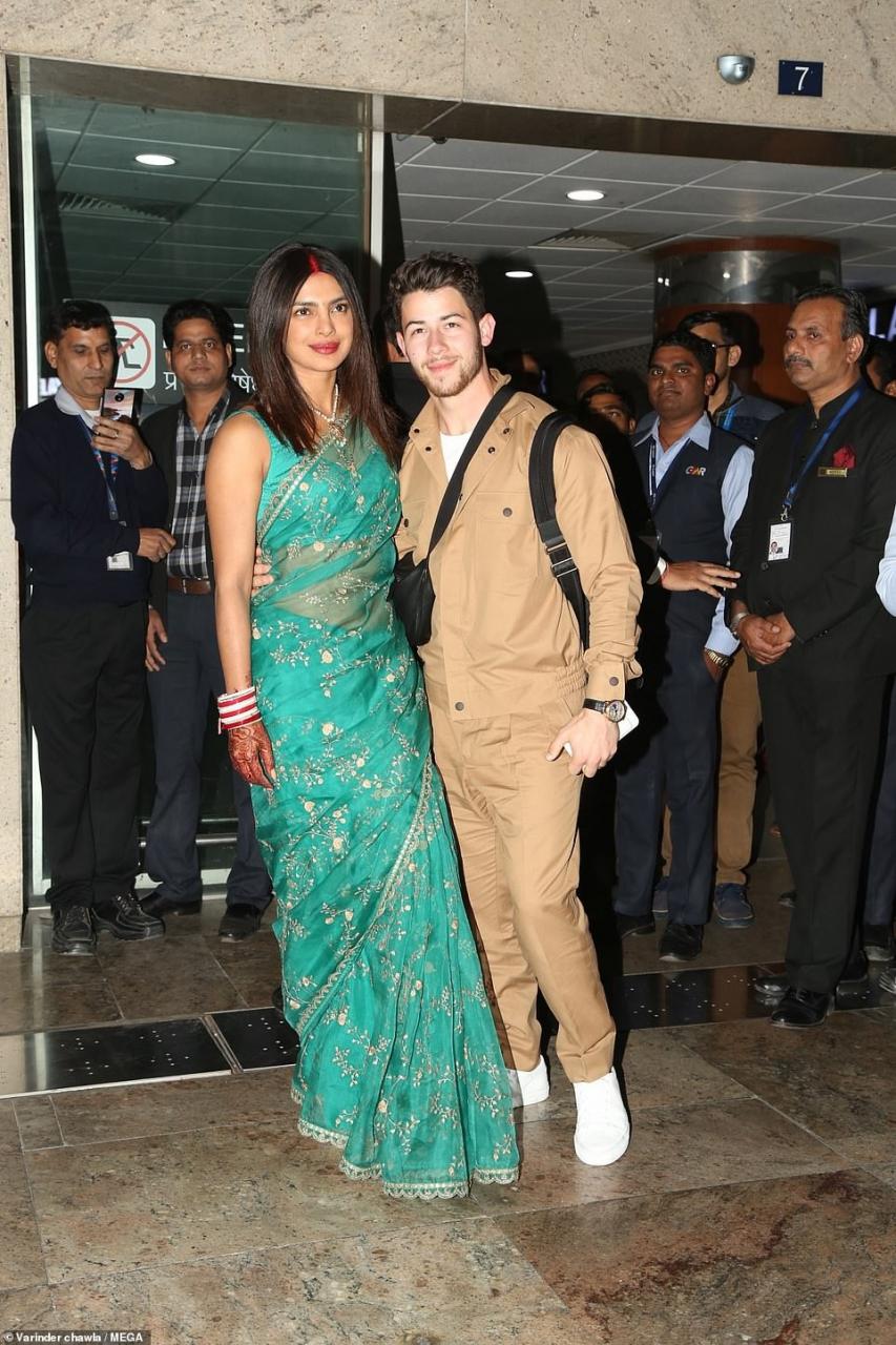 Newlyweds Priyanka Chopra and Nick arrive in style to celebrate another wedding reception in Delhi (Photos)