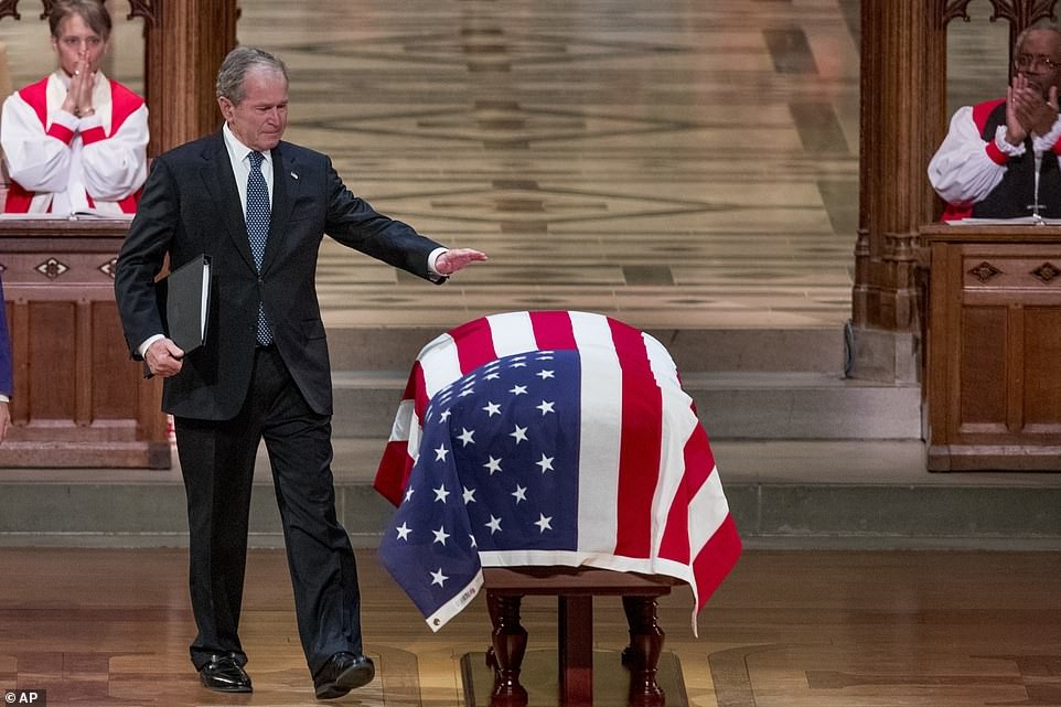 Former US president George W. Bush breaks down in tears as he says farewell to his late father George H.W. Bush at his funeral service. (Photos)
