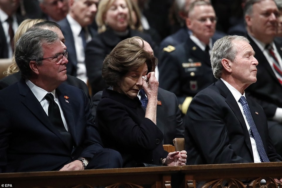 Former US president George W. Bush breaks down in tears as he says farewell to his late father George H.W. Bush at his funeral service. (Photos)