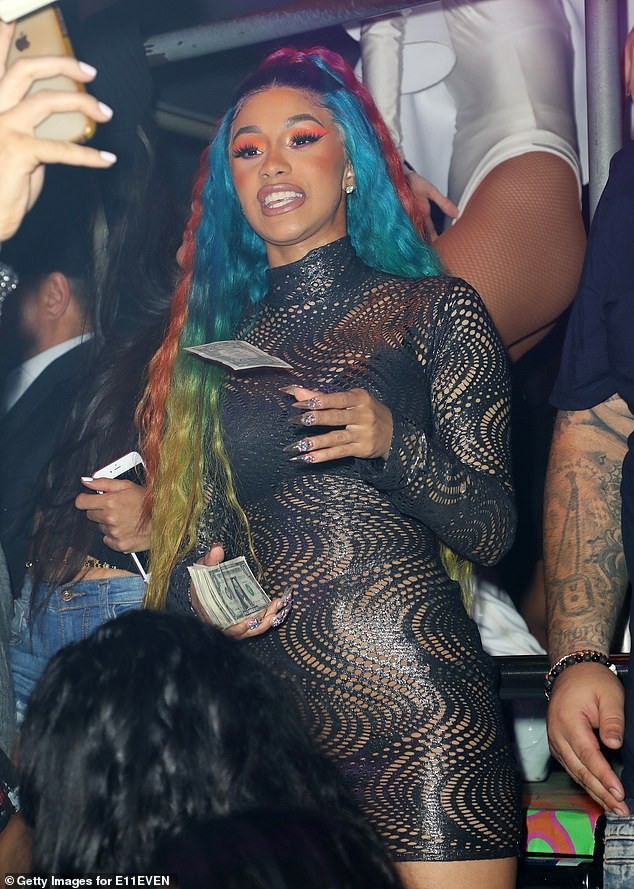 Cardi B parties in a revealing dress after announcing split from Offset