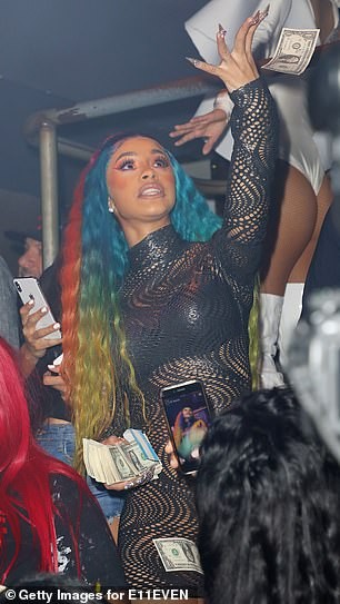 Cardi B parties in a revealing dress after announcing split from Offset