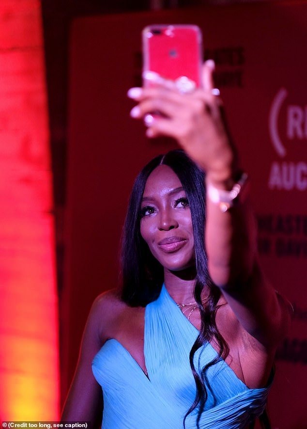Naomi Campbell dazzles in electric blue gown as she attends an event in Maimi (Photos)