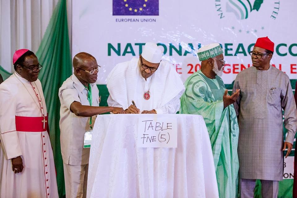 Photos: Atiku absent as President Buhari, other presidential candidates sign peace accord for peaceful election