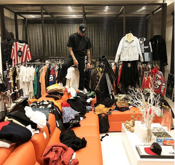 Chris Brown shows off his walk-in closet as he complains he
