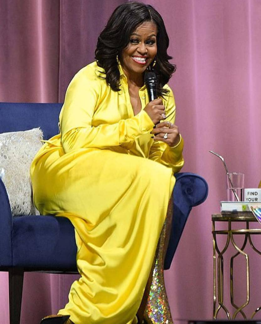 Michelle Obama makes lasting fashion statement as she steps out in a ,000 glittery thigh-high Balenciaga boots and yellow gown (photos)