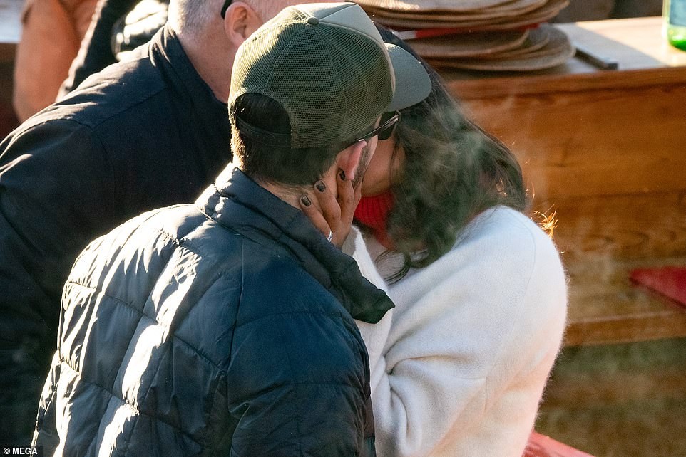 Priyanka Chopra plants a sweet kiss on her husband Nick Jonas as they enjoy lunch date with family and friends (Photos)