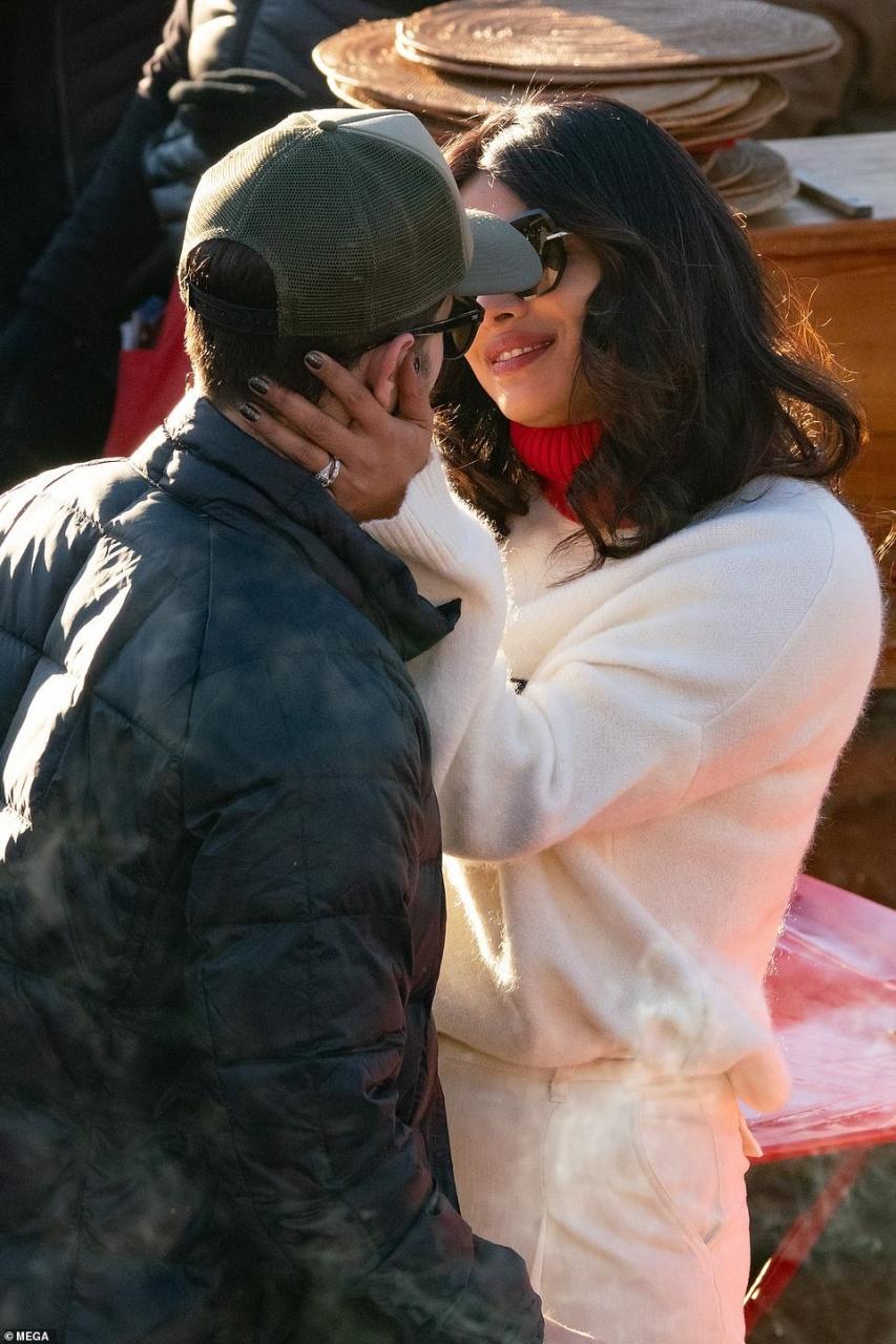Priyanka Chopra plants a sweet kiss on her husband Nick Jonas as they enjoy lunch date with family and friends (Photos)