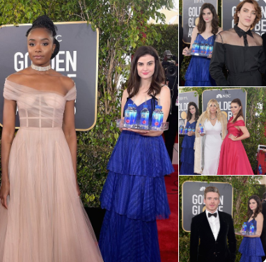 Unknown model steals show at the Golden Globes by photobombing stars on the red carpet