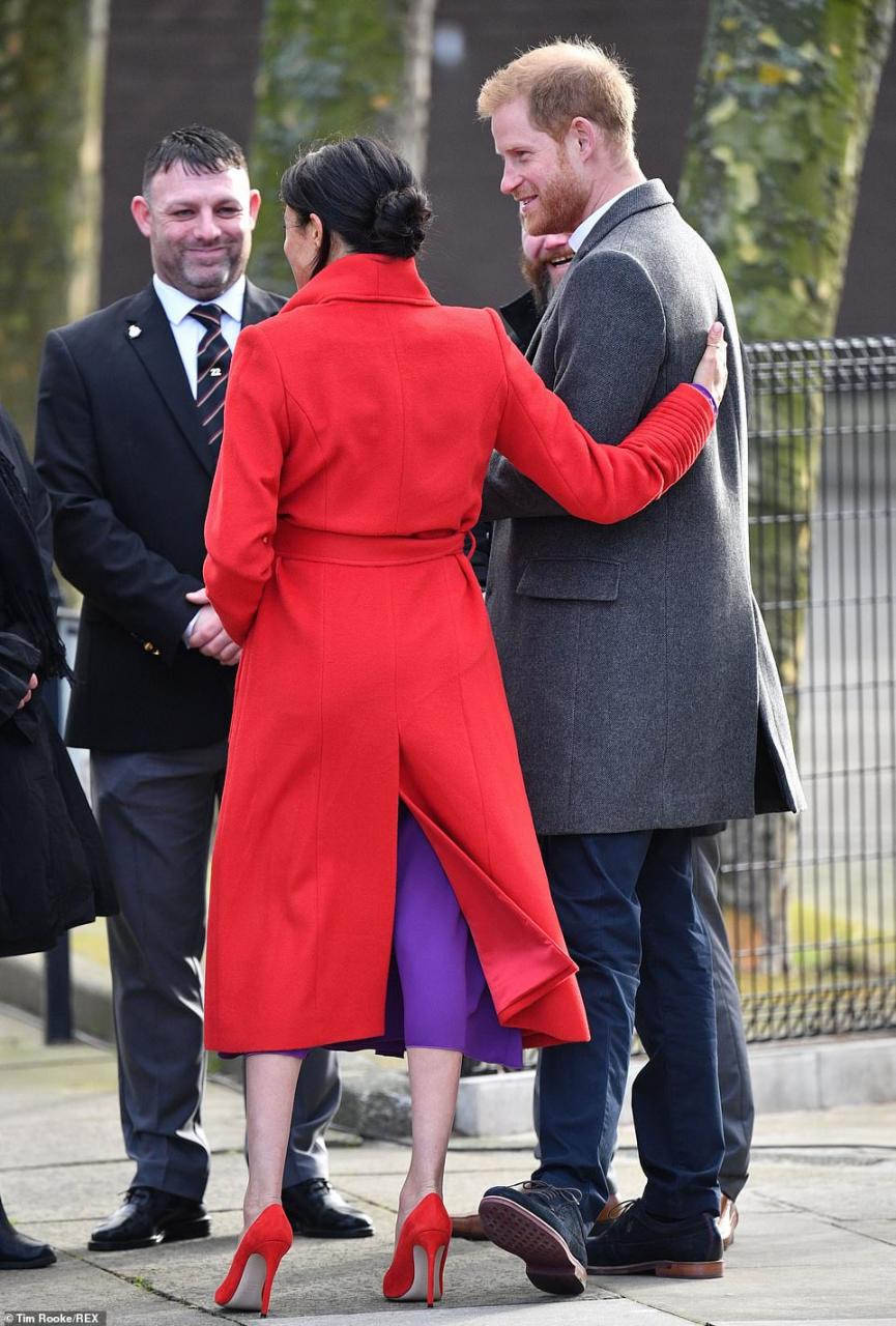 Meghan Markle lets slip her baby will arrive in April as she and Harry arrive in Birkenhead 