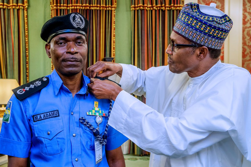 Breaking: President Buhari decorates Mohammed Adamu as the new acting Inspector General of Police (photos)