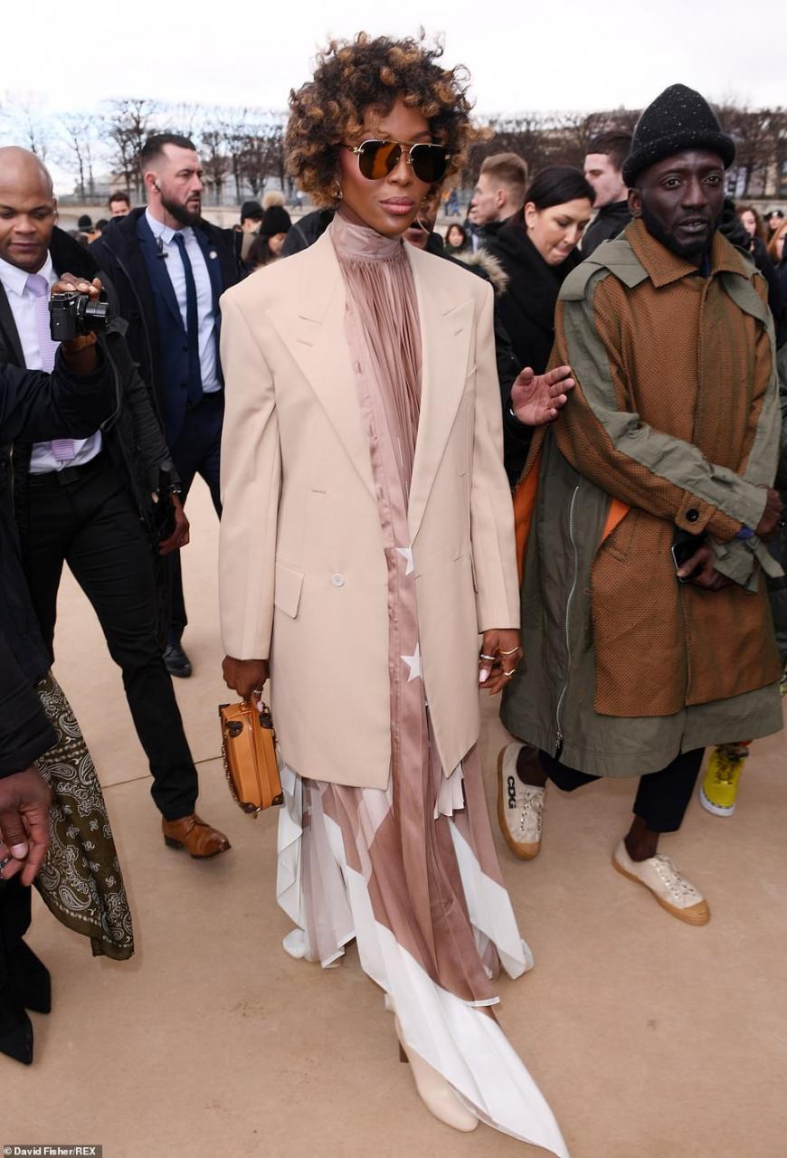  Naomi Campbell suffers wardrobe malfunction as she exposes her underwear at Louis Vuitton