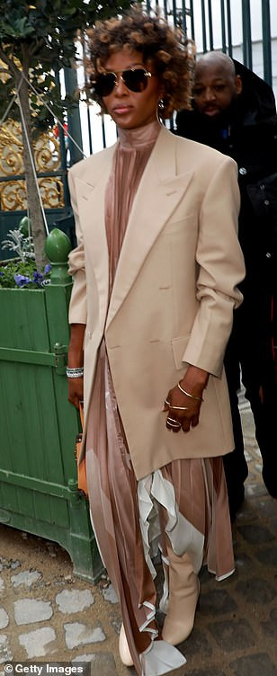  Naomi Campbell suffers wardrobe malfunction as she exposes her underwear at Louis Vuitton