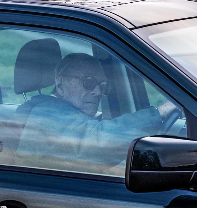 Prince Philip drives himself again just two days after he suffered a car crash in Sandringham