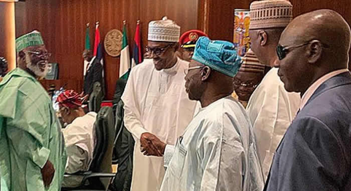 Photos: President Buhari, Obasanjo all smiles as they shake hands at Council of State meeting in Abuja today