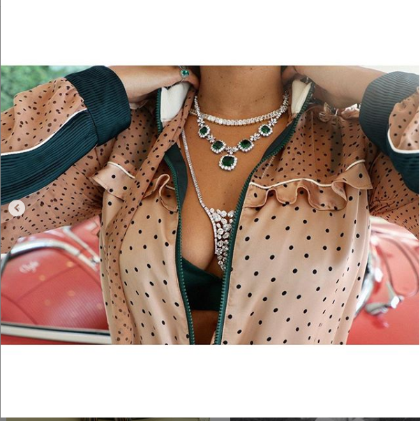 Beyonce flaunts her cleavage as she poses in a polka dot jumpsuit and diamonds in new sexy photos
