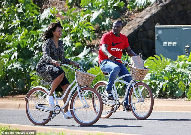 Idris Elba enjoys a romantic bike ride with his stunning fianc?e Sabrina Dhowre during their Hawaii break (Photos)