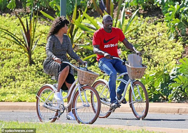 Idris Elba enjoys a romantic bike ride with his stunning fianc?e Sabrina Dhowre during their Hawaii break (Photos)