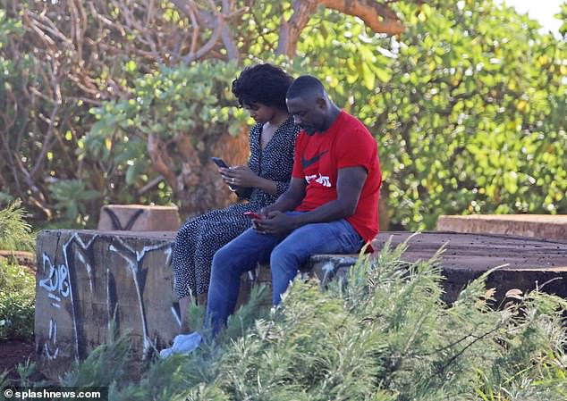 Idris Elba enjoys a romantic bike ride with his stunning fianc?e Sabrina Dhowre during their Hawaii break (Photos)