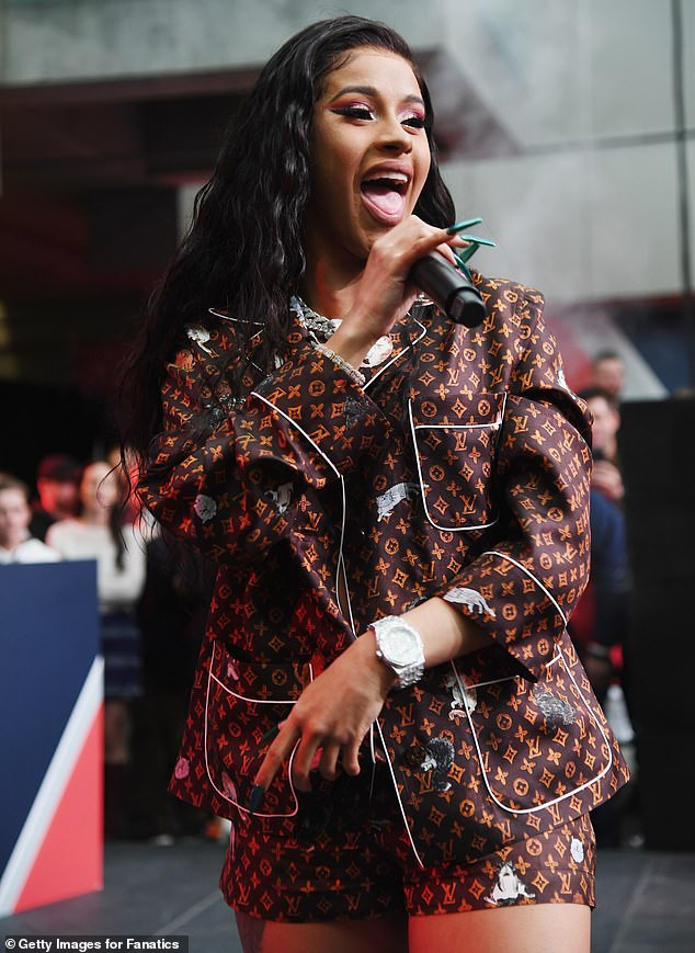 Cardi B flaunts her boobs in skimpy gold bra and shorts at Fanatics Super Bowl party in Atlanta (Photos)