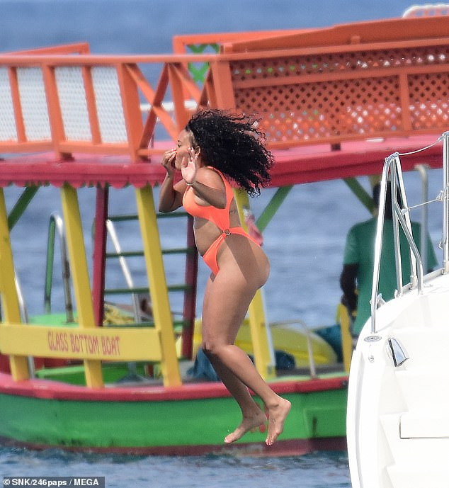 Angela Simmons flaunts her banging bikini body as she vacations in Barbados