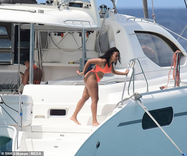 Angela Simmons flaunts her banging bikini body as she vacations in Barbados