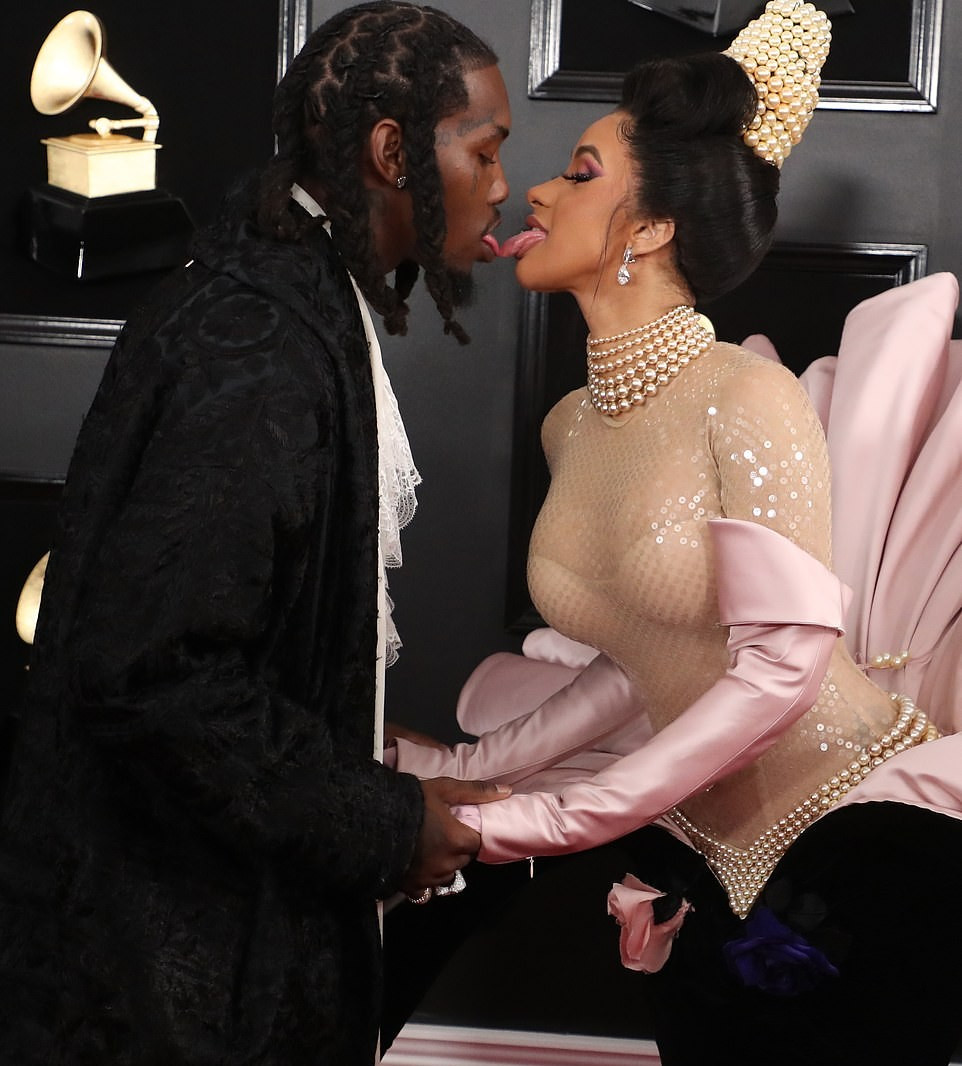 Cardi B and Offset go tongue-to-tongue on the Grammys red carpet