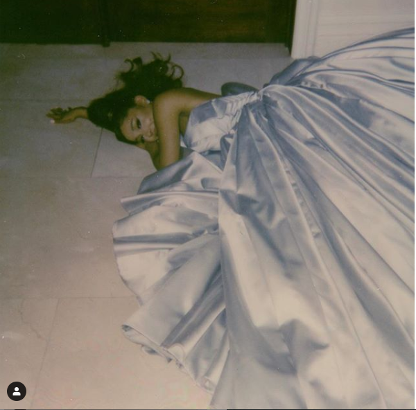 Ariana Grande wears her Grammy