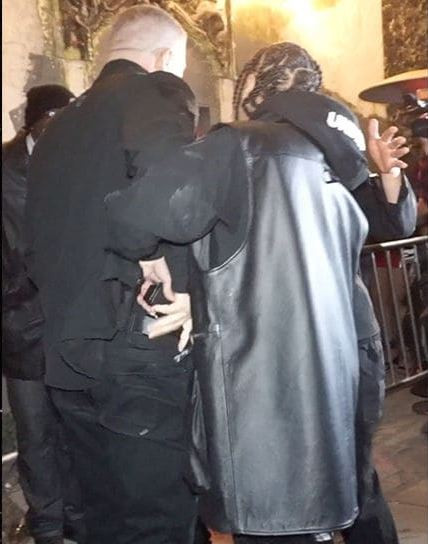Photos: Tyga reaches for a gun after he was violently dragged out of Floyd Mayweather