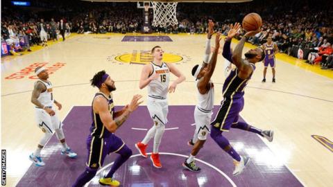 LeBron James shoots to overtake Michael Jordan's record