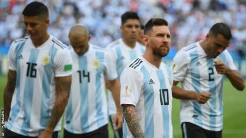 Argentina captain Lionel Messi and team-mates wait on the pitch before their 2018 World Cup last-16 match against France