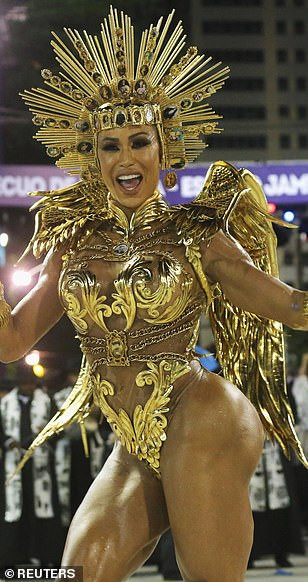 See photos from Rio de Janeiro carnival as thousands of Brazilian dancers parade their assets in sparkly G-strings