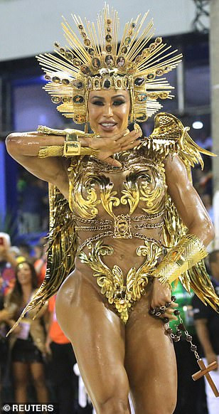 See photos from Rio de Janeiro carnival as thousands of Brazilian dancers parade their assets in sparkly G-strings