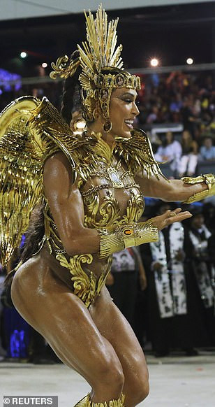 See photos from Rio de Janeiro carnival as thousands of Brazilian dancers parade their assets in sparkly G-strings