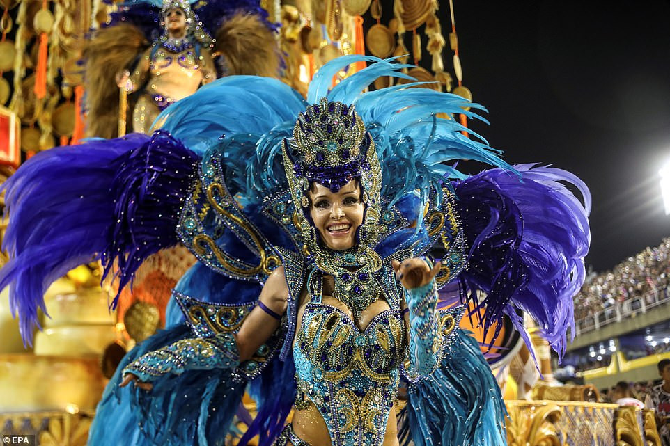 See photos from Rio de Janeiro carnival as thousands of Brazilian dancers parade their assets in sparkly G-strings