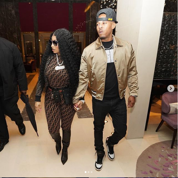 Nicki Minaj shares loved-up photos with her man as they pose together in?front of the Eiffel Tower?