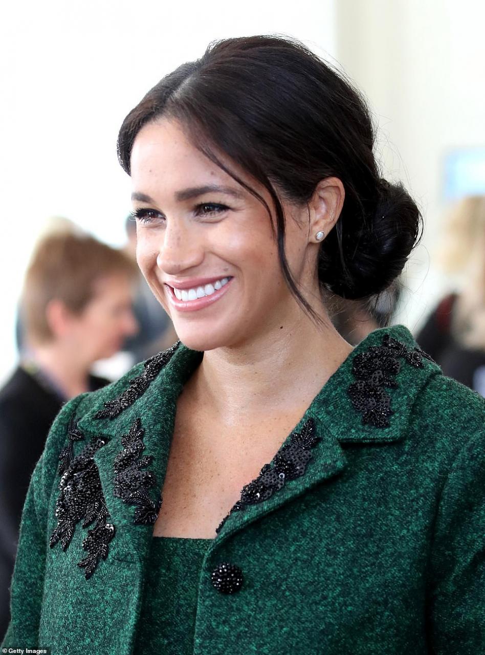 Pregnant Meghan Markle steps out in towering heels as she accompanies Prince Harry to event