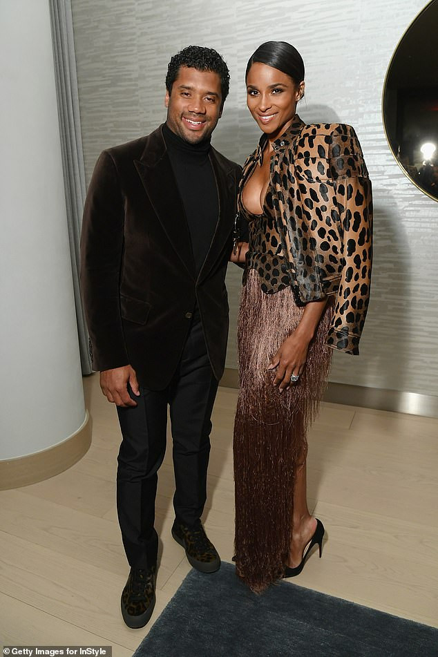 Ciara flaunts cleavage in plunging animal print ensemble as she attends InStyle Dinner with her husband  (Photos)