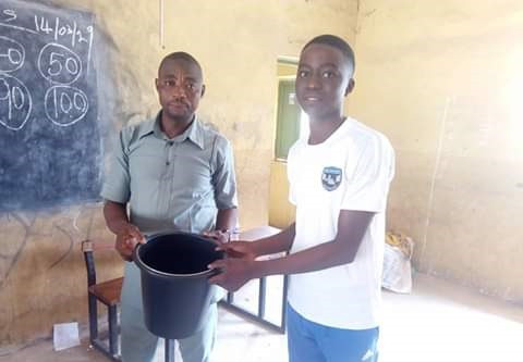 Photos: Student teachers gifted plastic buckets by Headmaster during their sendforth in Abuja